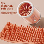 Dog paw being cleaned in silicone paw cleaner cup — Pawnests