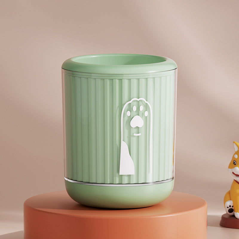 Cat paw being cleaned with Pawnests silicone paw washer