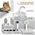Pet grooming tool set with a cat, vacuum device, cleaning brushes, crevice tool, hair trimmer, and de-shedding brush on a gray background.