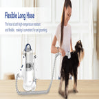 Person grooming a dog with a flexible long hose device in a home setting.