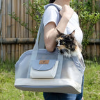 Cat sitting inside pet shoulder carrier bag — spacious 15L interior up to 7.5kg | Pawnests