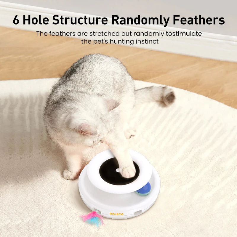 Cat playing with ROJECO automatic feather teaser toy | Pawnests